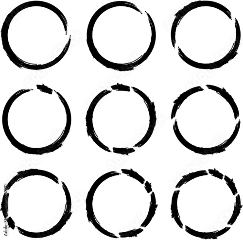 Set of Grunge Black and White Circle Frames . Vector