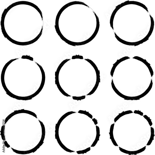 Set of Grunge Black and White Circle Frames . Vector