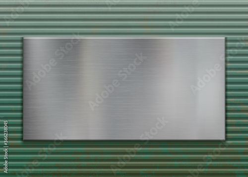 Polished metal plate on a corrugated steel background
