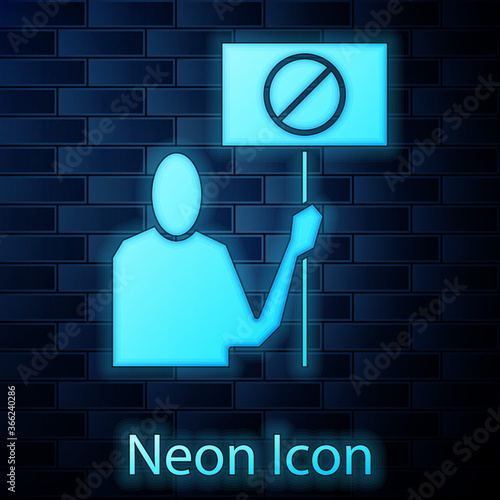 Glowing neon Nature saving protest icon isolated on brick wall background. Earth planet protection, environmental issues demonstration. Vector Illustration.