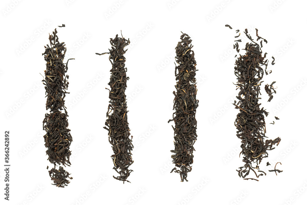 Leaves of black premium dry tea on a white background Leaves of black premium dry tea on a white background