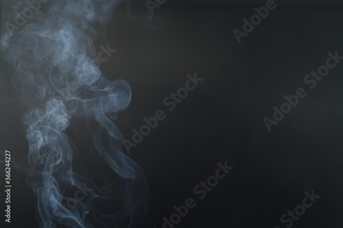 Drift movement color smoke girl black background With copy space.