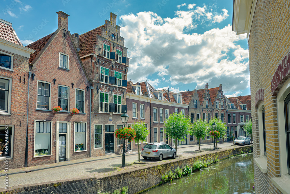 Traditional dutch canal houses in the historic town of Oudewater, Holland