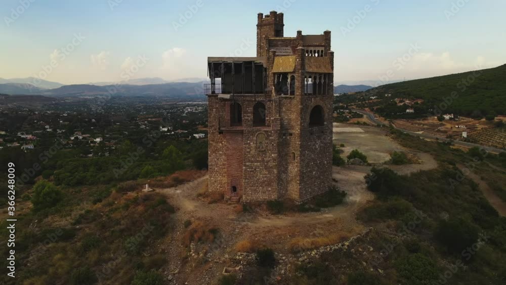 Aerial backwards view of abandoned castle Aerial backwards view of abandoned castle