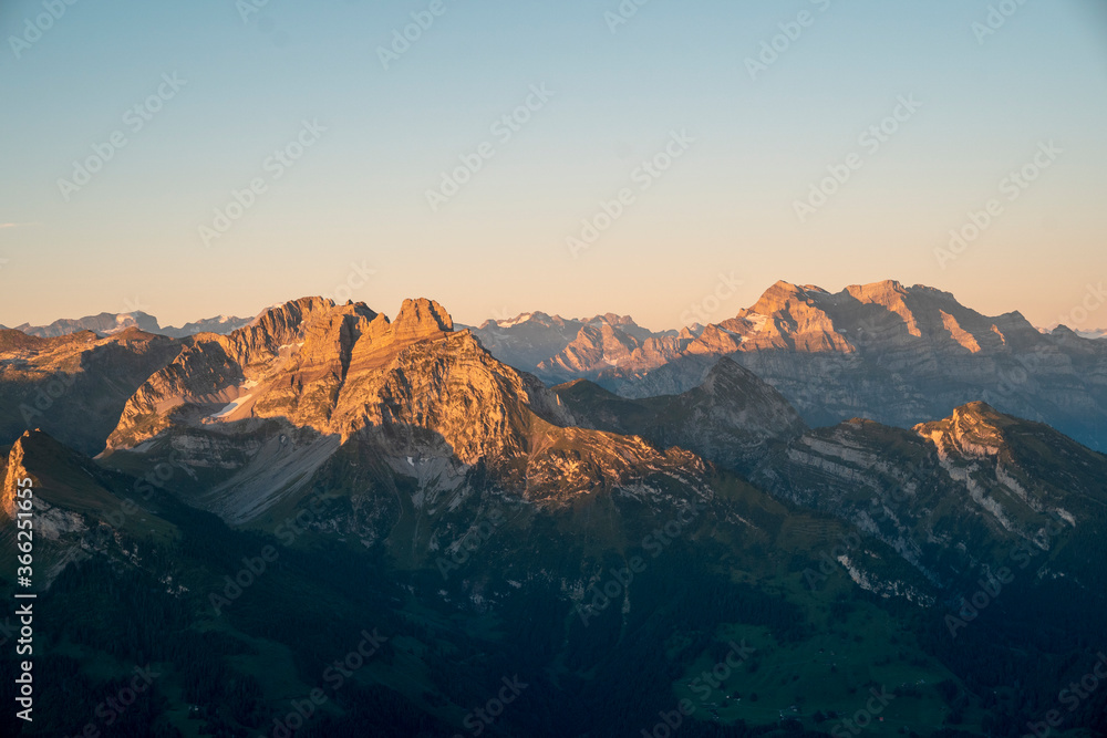 Beautiful sunrise on mountain top in the Swiss alps