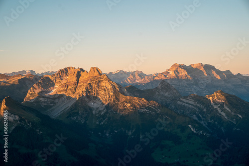 Beautiful sunrise on mountain top in the Swiss alps © Jonas