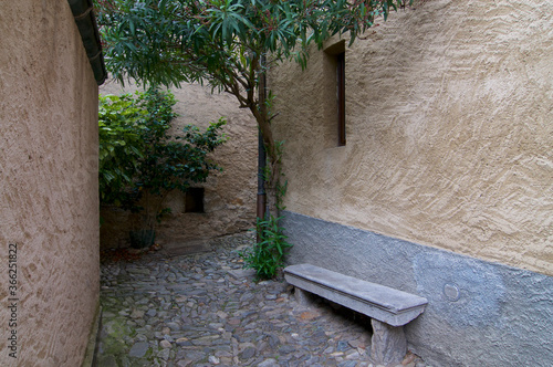 Typical village center alley found in the Canton of Ticino, Switzerland photo