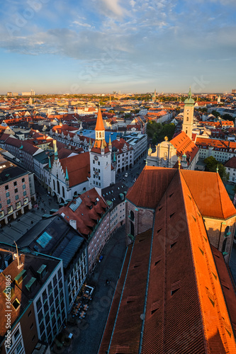 Aerial view of Munich - Marienplatz and Altes Rathaus from St. Peter's church on sunset. Munich, Germany