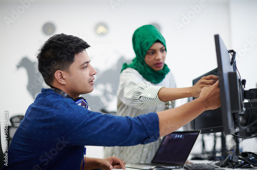 Multiethnic startup business team with Arabian woman photo