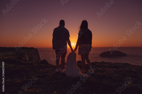 The couple against the beautiful sunset © Jorge