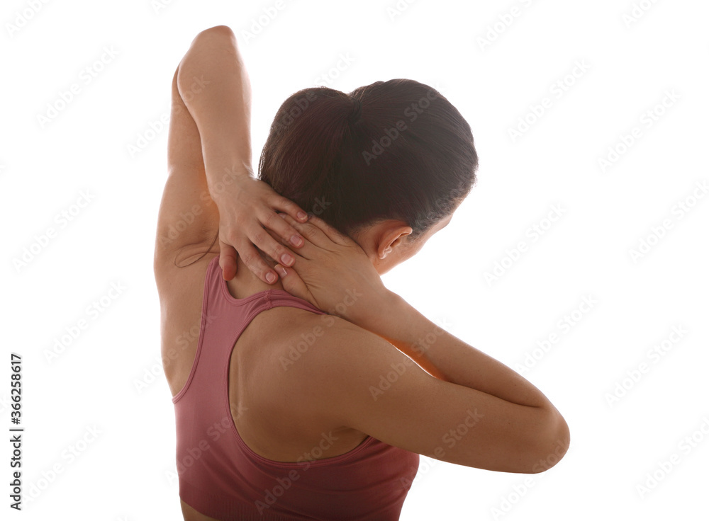 Obraz premium Young strong sporty woman suffering from chronic neck pain. Touching and massaging the hands. Closeup portrait isolated on white background.