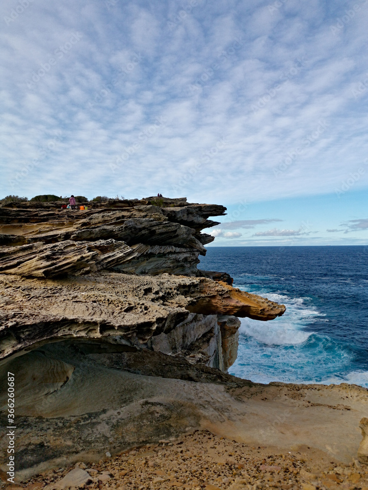 Beautiful and colorful rock formations along the sea cliff, Royal National Park, Sydney, New South Wales, Australia