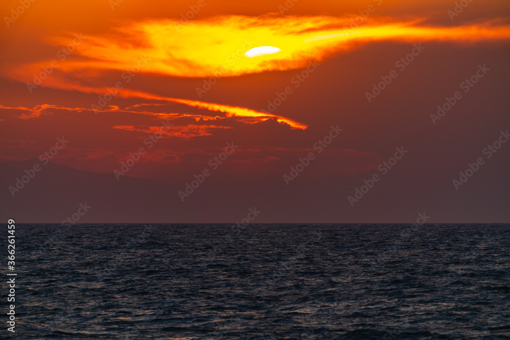 Dark dramatic sunset over the sea