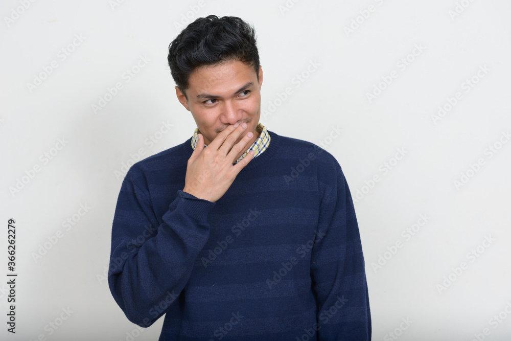Portrait of handsome Asian man with sweater Portrait of handsome Asian man with sweater