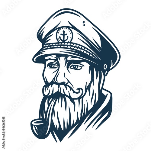 Bearded ship sailor with captain cap and a pipe photo
