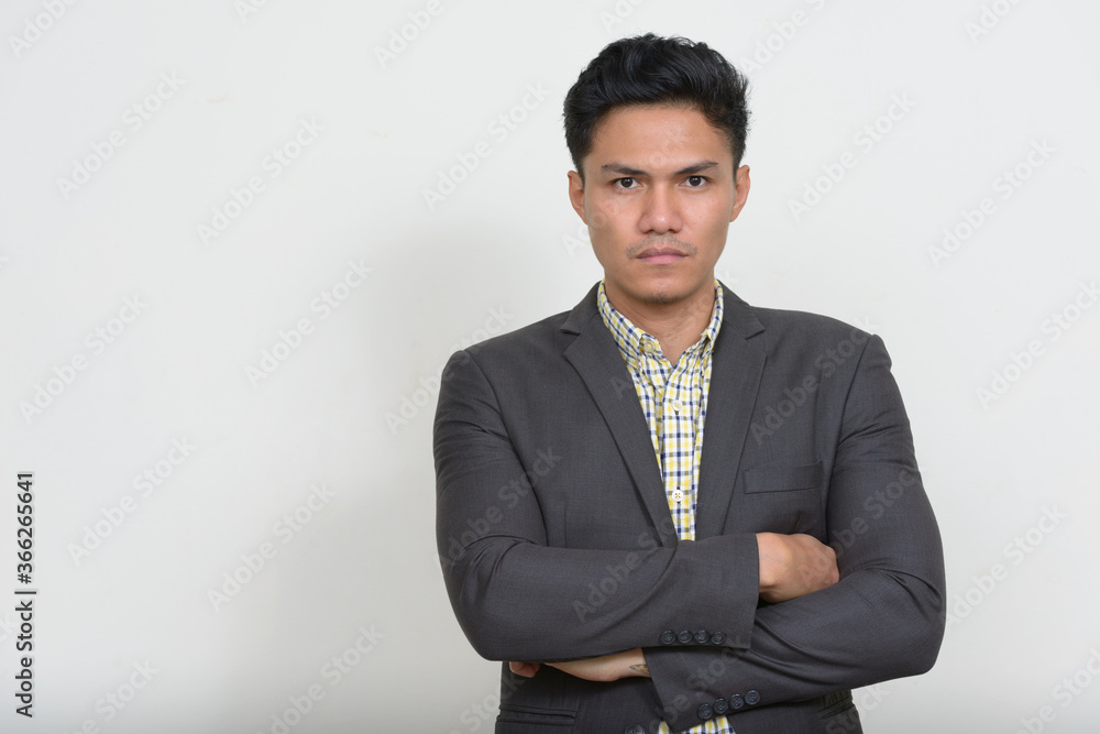 Portrait of handsome Asian businessman in suit Portrait of handsome Asian businessman in suit