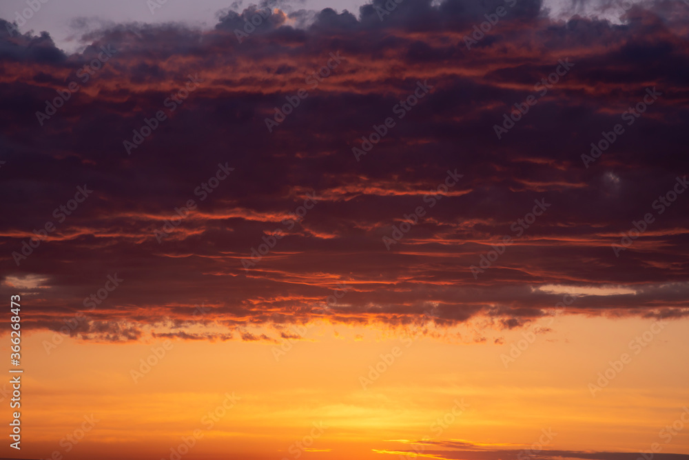 Bright red-orange mystical sunset. Abstract background.