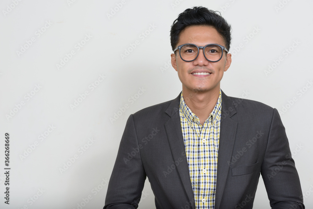 Portrait of handsome Asian businessman in suit Portrait of handsome Asian businessman in suit