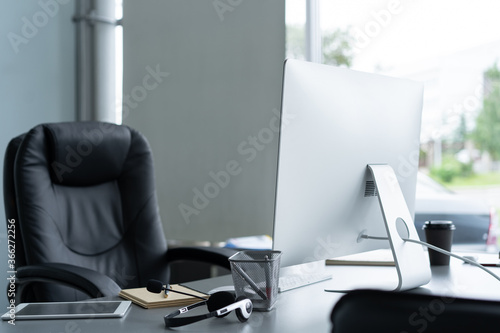 Wallpaper Mural Stylish workspace with desktop computer, office supplies at office. Desk work concept. Torontodigital.ca
