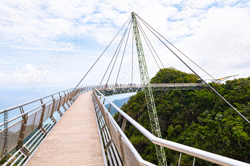 The sky bridge in the north of Langkawi, Malaysia. The landmark of the small Malaysian Island. One pillar and 12 cable holding the bridge over the valley. A breathtaking view over the Andaman Sea 