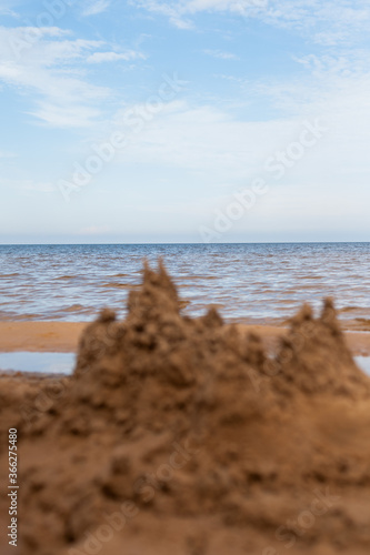 Sand castle by the water