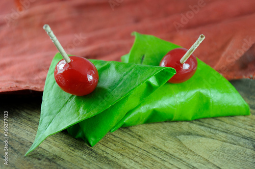 sweet paan wrapped in betel leaf, often used as an after dinner digestive.
