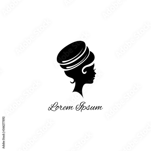 A cute girl and macaroon from her hear on the top. Vector logo illustration on the white background