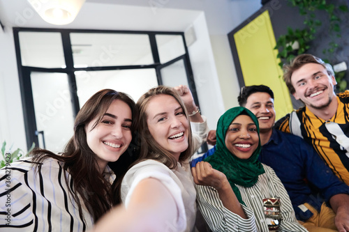 group of casual multiethnic business people taking selfie © .shock