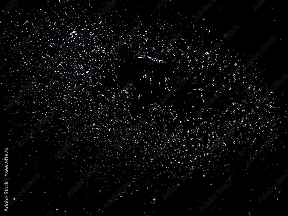 Obraz premium Colorful defocused abstract water droplets in glass with bokeh background