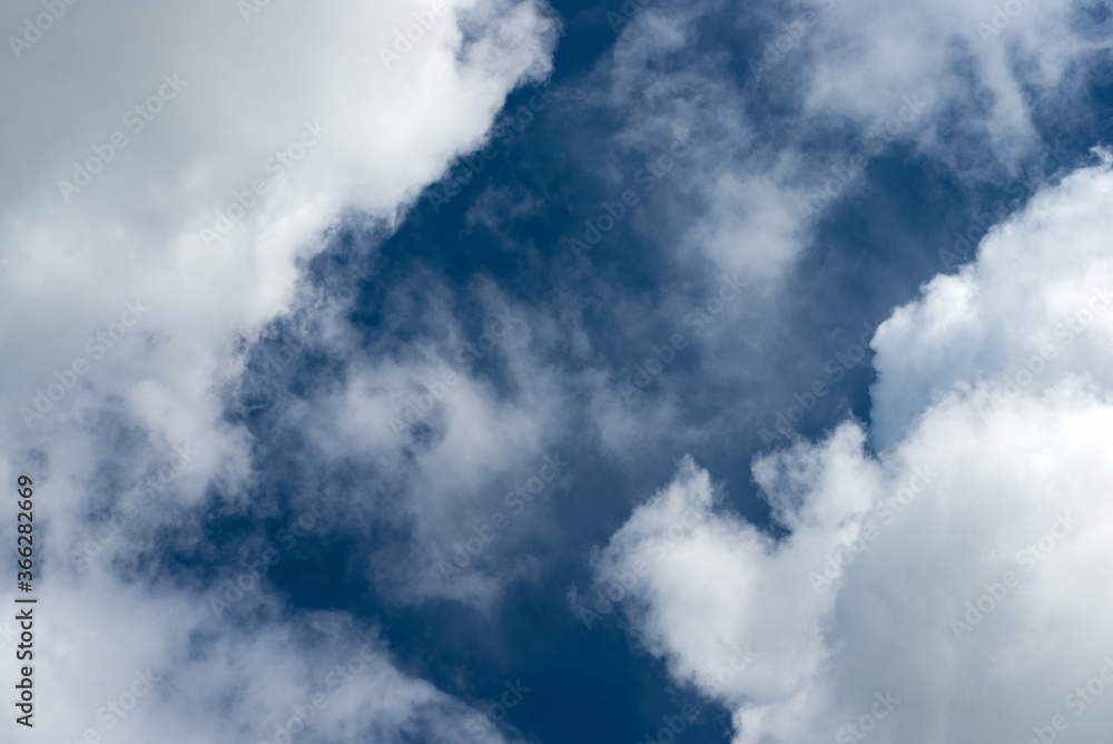 Cumulus clouds in the blue sky during the day in Sunny weather