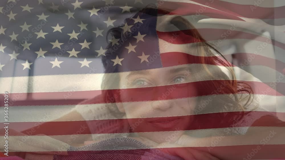 Animation of American flag waving over happy woman on beach by seaside on summer holiday Animation of American flag waving over happy woman on beach by seaside on summer holiday
