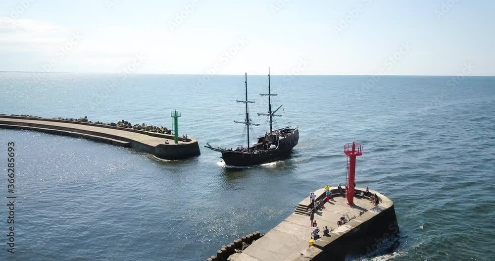 Ship arriving in port. Aerial shot Ship arriving in port. Aerial shot