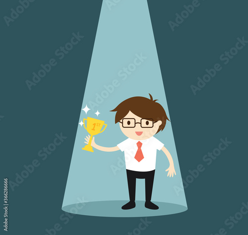 Business concept, businessman standing in the spotlight while holding trophy. Vector illustration.