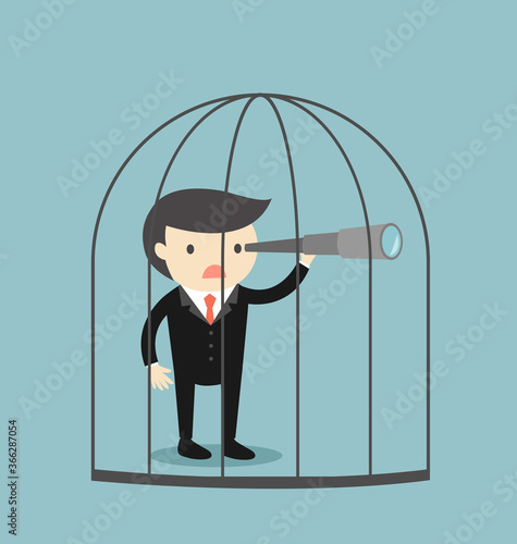 Business concept, Boss/Businessman using his telescope inside the jail.