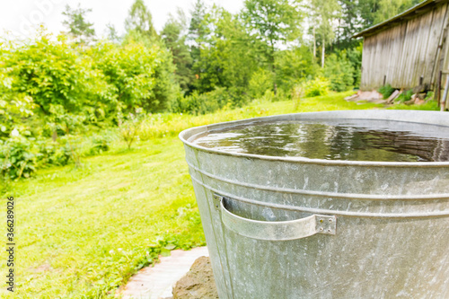 rainwater bucket in garden