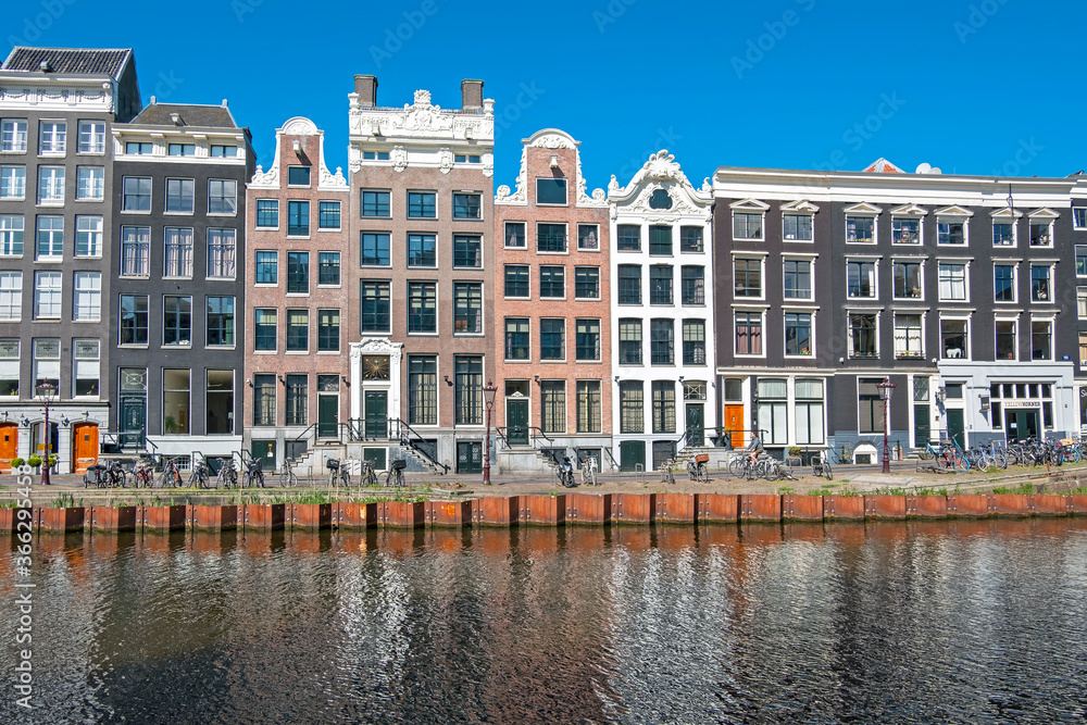 Dutch facades along the canal in Amsterdam the Netherlands