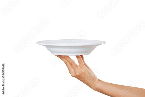 White plate on hand woman on white