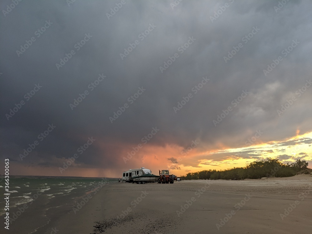 Storm at sunset on the beach Storm at sunset on the beach