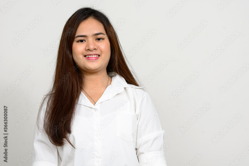 Portrait of happy young beautiful Asian woman Portrait of happy young beautiful Asian woman