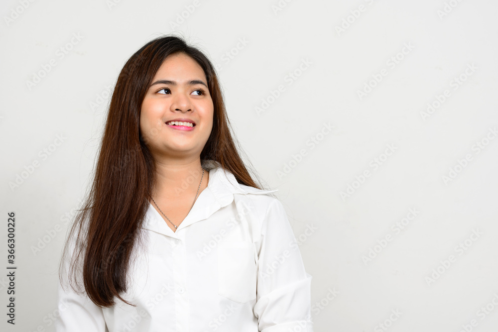 Portrait of happy young beautiful Asian woman Portrait of happy young beautiful Asian woman