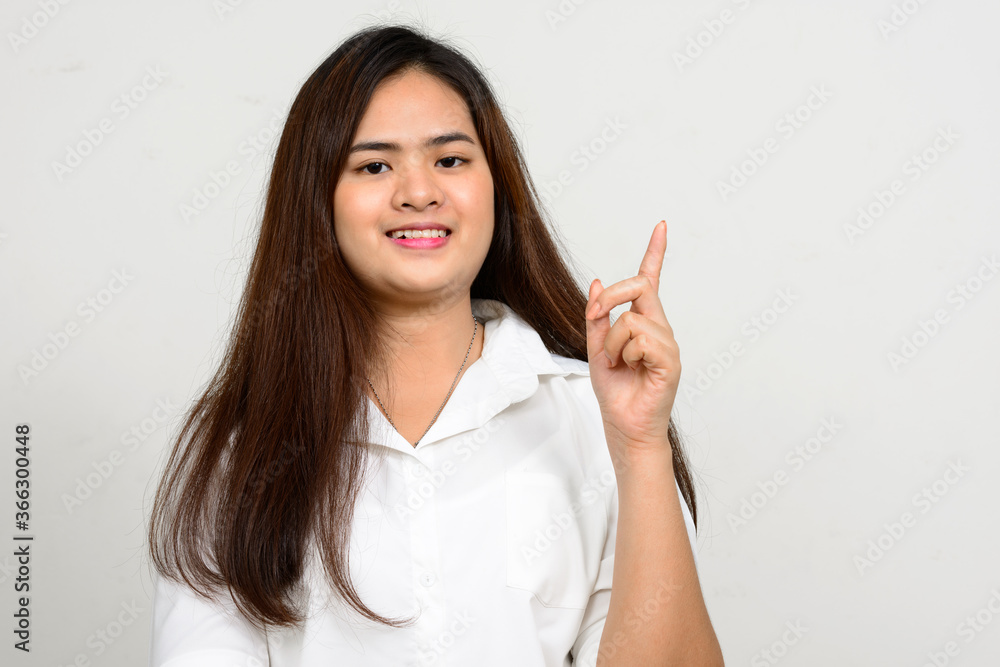 Portrait of happy young beautiful Asian woman Portrait of happy young beautiful Asian woman