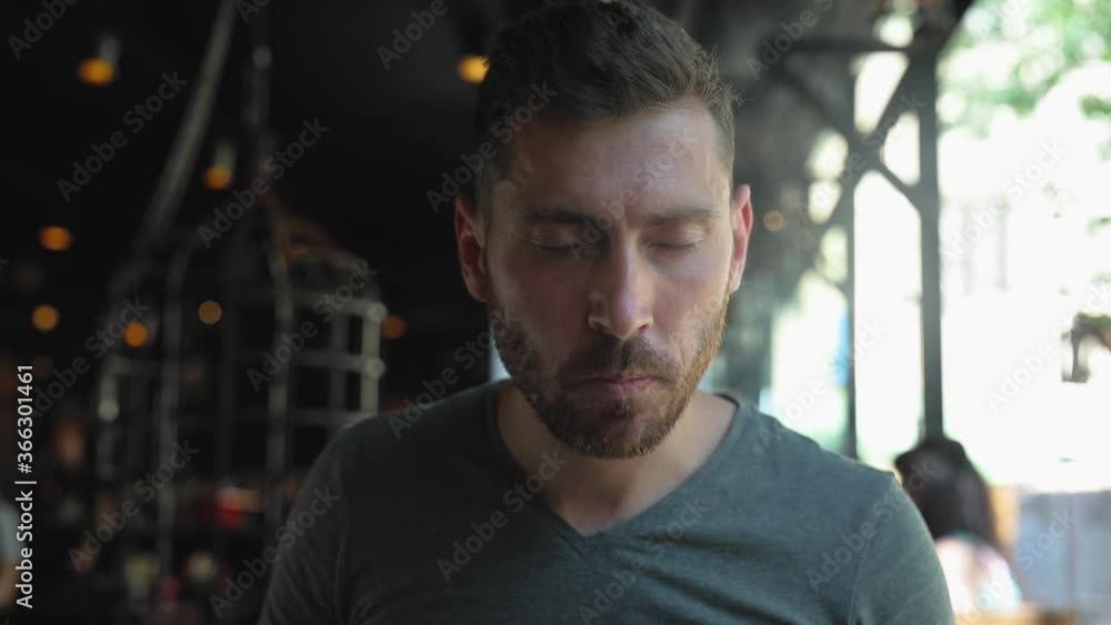 Man Eating Food, Meat Steak In Restaurant Closeup. Male Enjoying Taste With Closed Eyes, Showing Thumbs Up, Like Man Eating Food, Meat Steak In Restaurant Closeup. Male Enjoying Taste With Closed Eyes, Showing Thumbs Up, Like