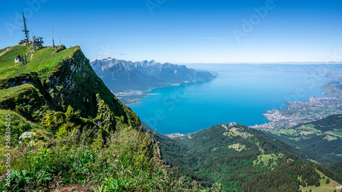 Fototapeta Naklejka Na Ścianę i Meble -  Top panoramic view of Geneva lake taken from Rochers-de-Naye or rocks of Naye mountain with summit in Swiss Alps Switzerland