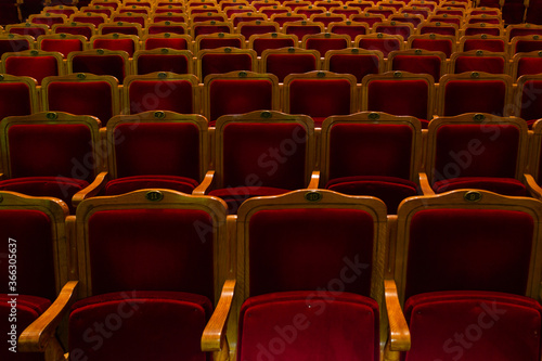 Row of red seats in theatre