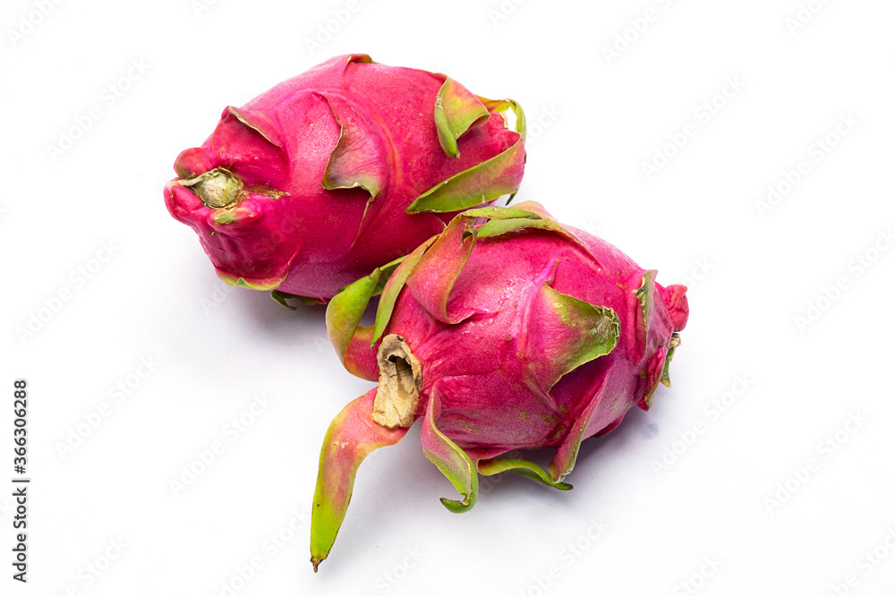 Close-up two fresh dragon fruit isolated on white background. selective focus, soft focus.