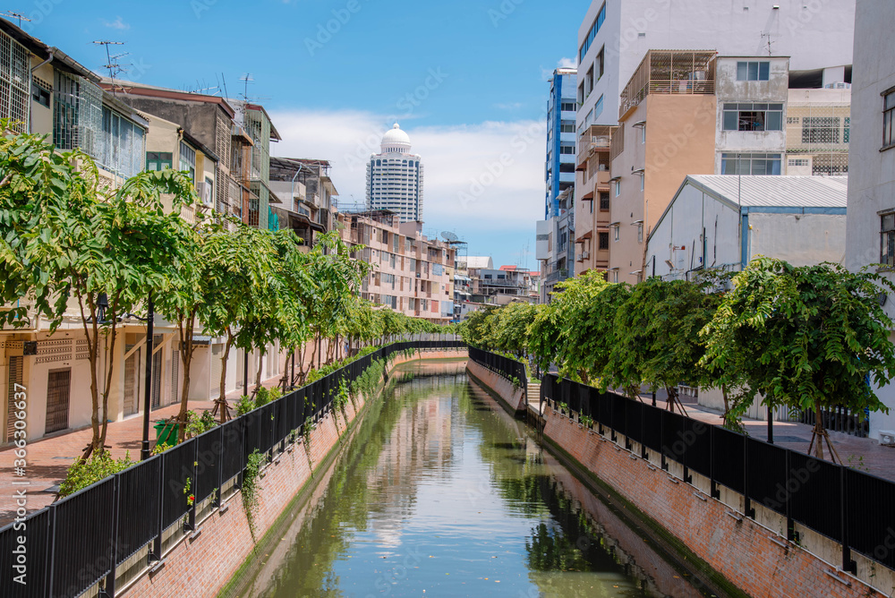 A canal flanked by a building in Bangkok, Thailand, July 19, 2020