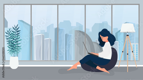 The girl sits on an ottoman and works at a laptop. A woman with a laptop sits on a large pouf. The concept of comfortable work in the office or at home. Vector.