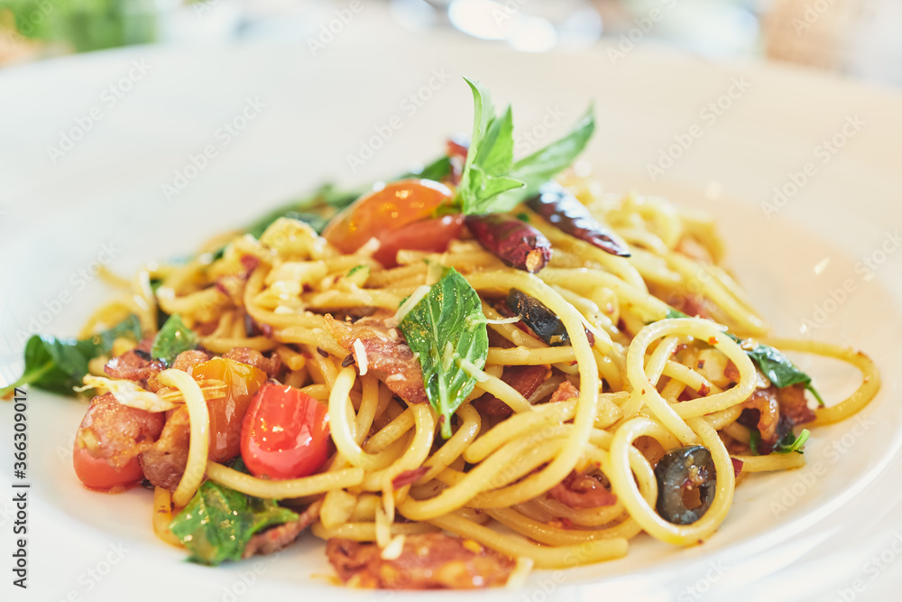 ฺBasil in stir fried spicy spaghetti ฺBasil in stir fried spicy spaghetti