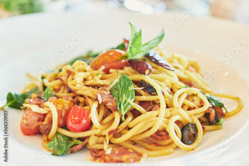 ฺBasil in stir fried spicy spaghetti