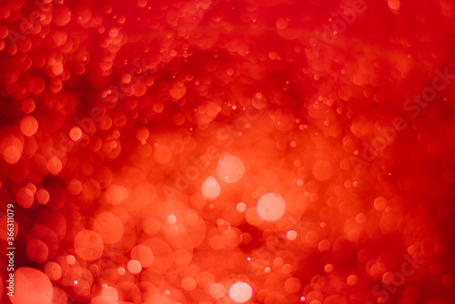 Ruby red bokeh background with soft blur bokeh light effect, background bokeh